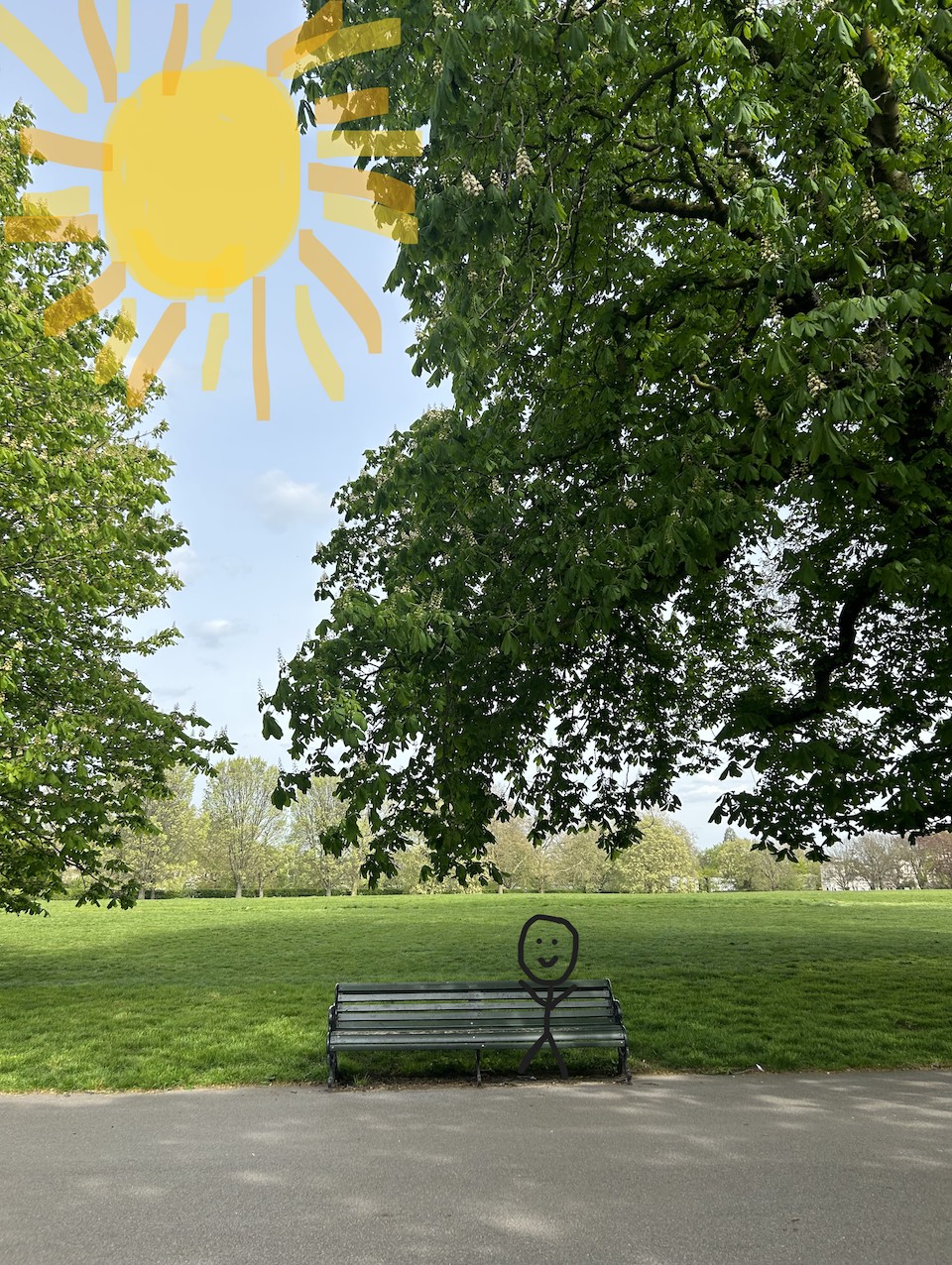 A stick figure sitting on a bench in Regent's Park with a doodled sun in the sky 